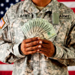 Soldier: Holding Money Fan